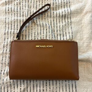 Michael Kors Tan Wristlet with Gold Logo